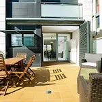 Casa Adosada Con Piscina, Jardin Comunitario Y Garaje En El Centro De Roses - Es-228-104